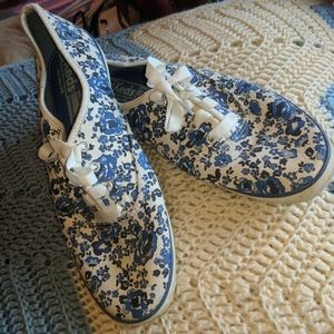 White keds with blue flowers